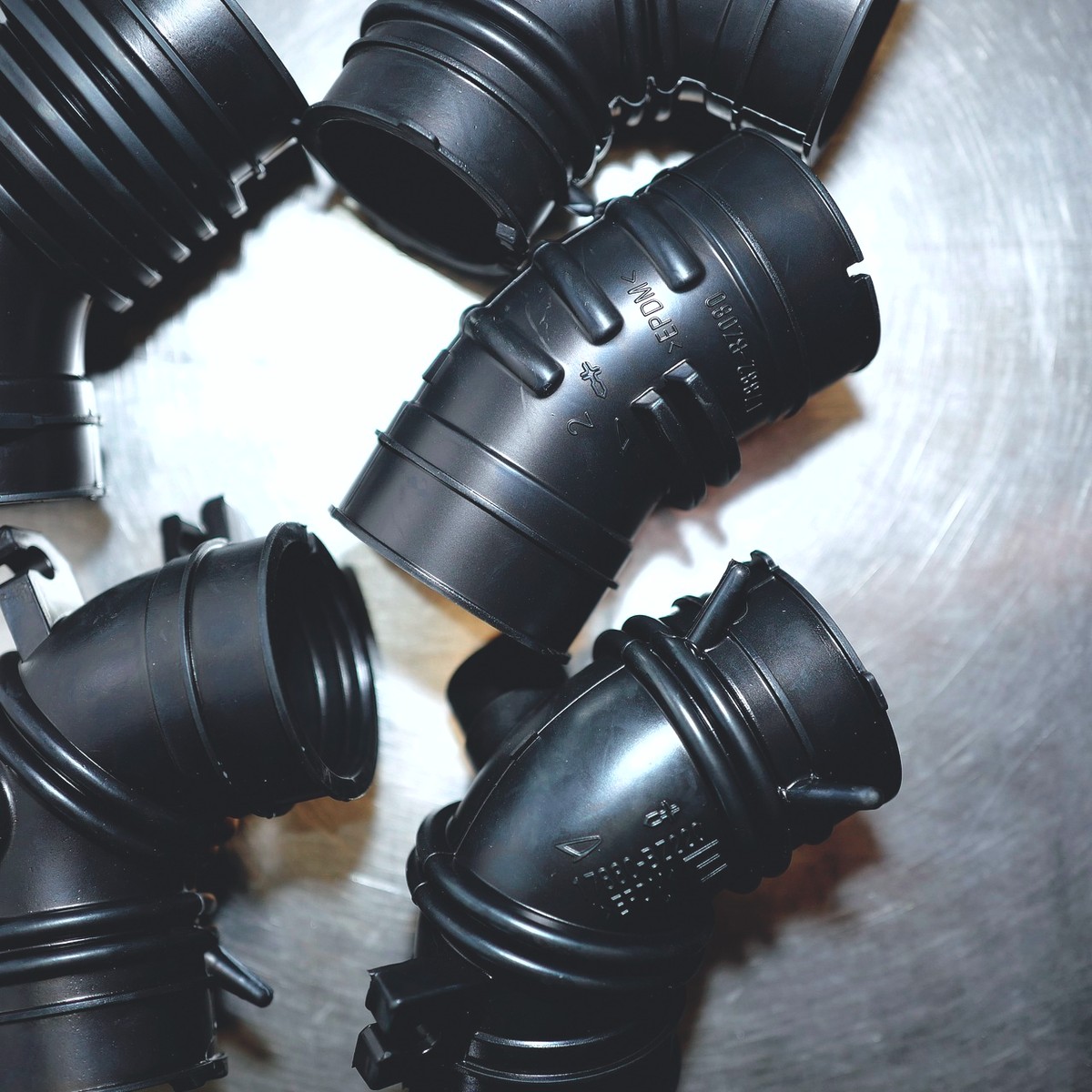 Air-intake duct hoses — molded EPDM and silicone intake hoses, varied geometries